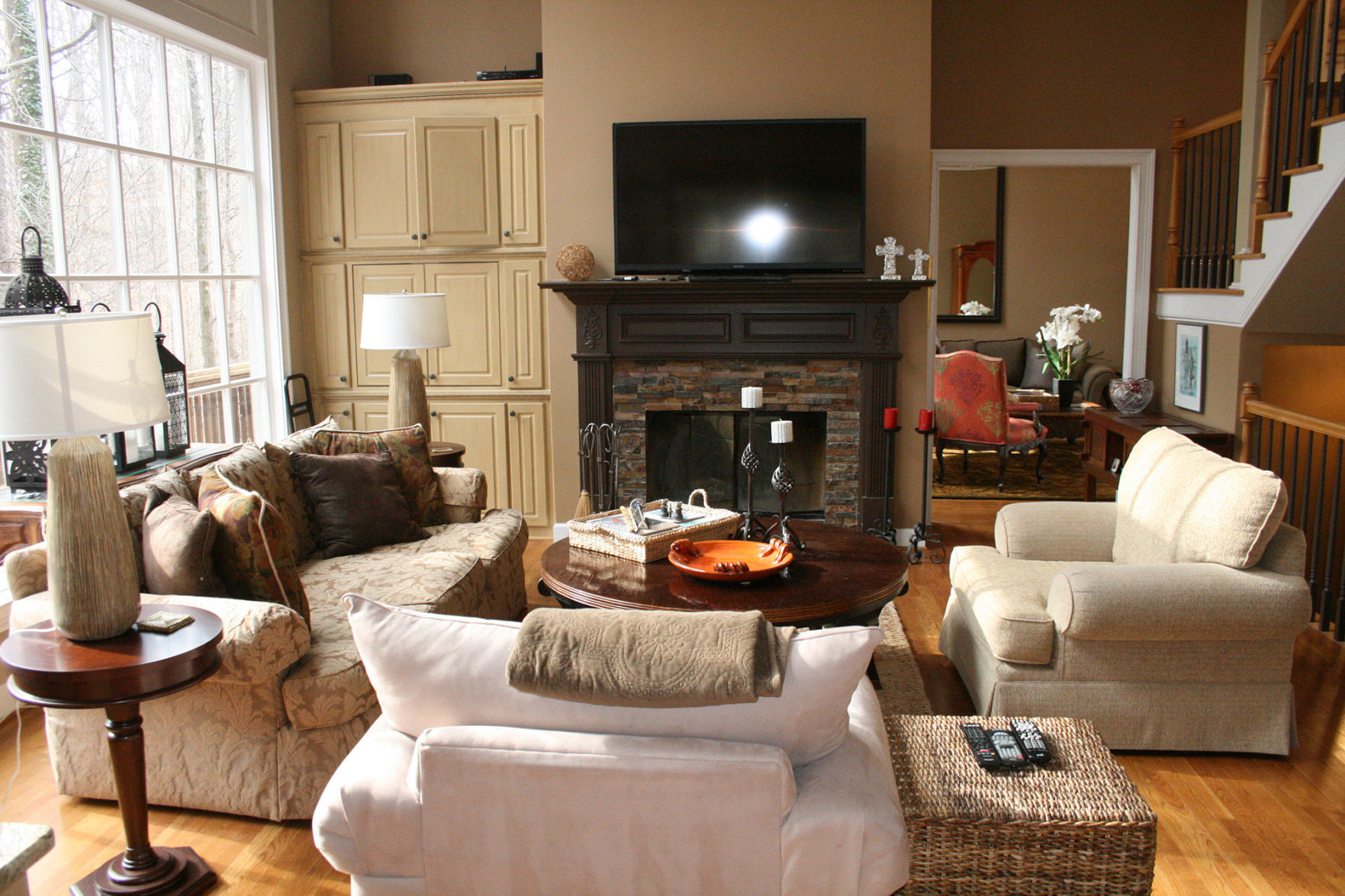 DO: Create a furniture configuration around a focal point in the room.